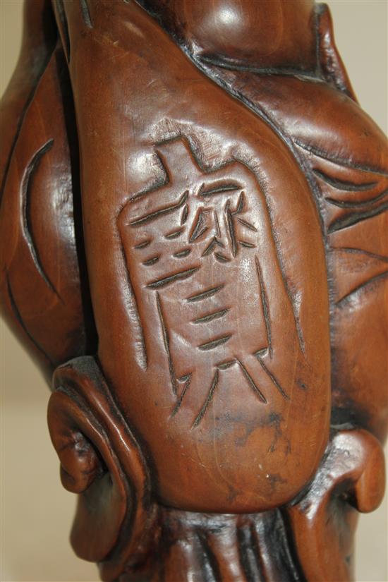 A Chinese boxwood carving of Budai, 22cm